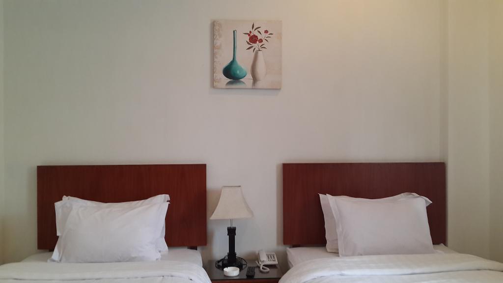 Kailani Inn Medan Room photo